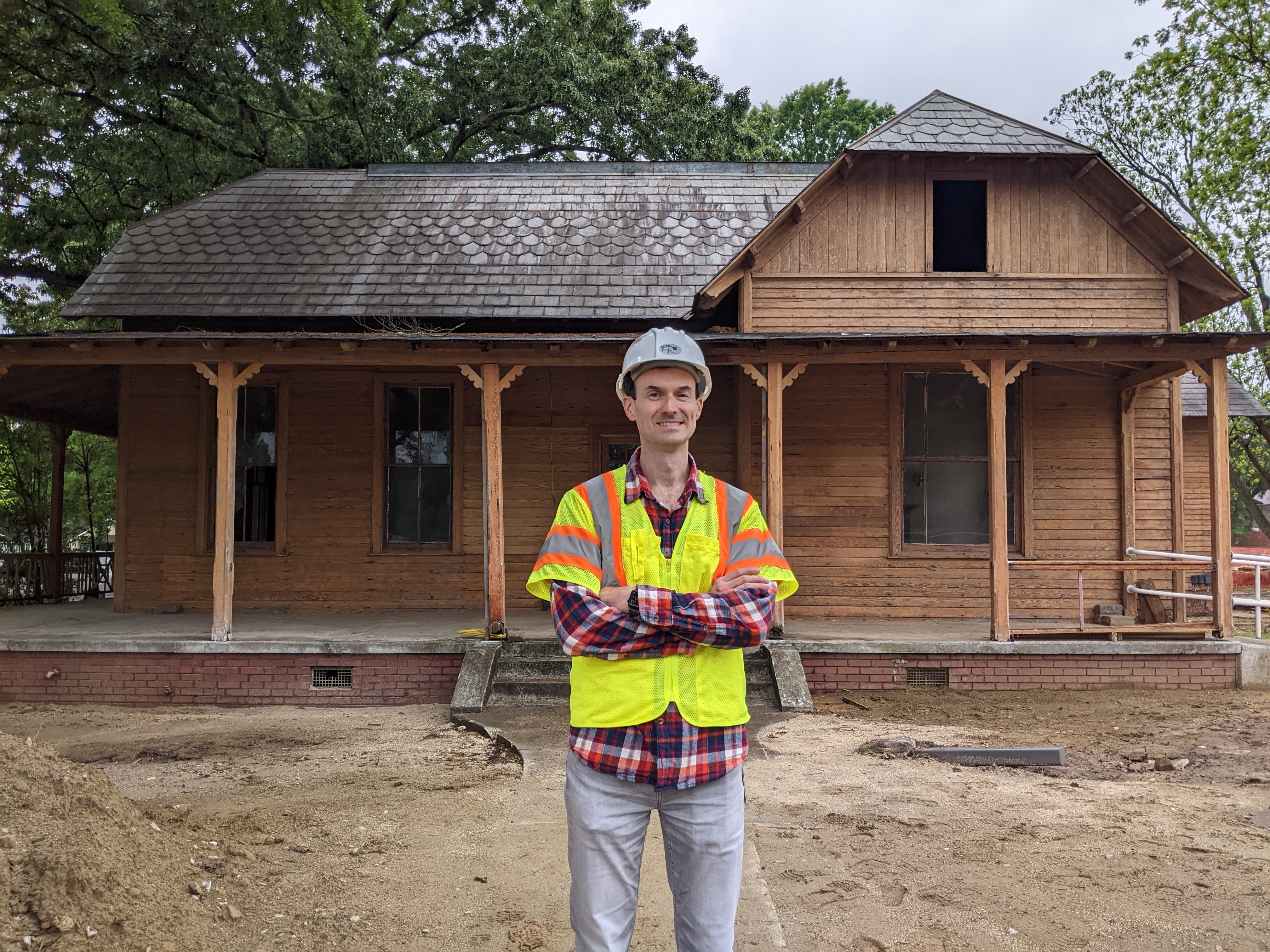 House of Many Porches after abatement with Gipson Play Plaza project manager, Dean Perry ca. 2023