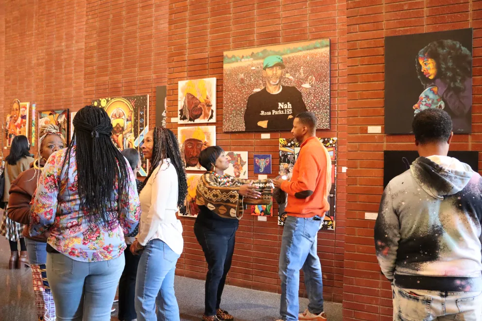 people at an art exhibit