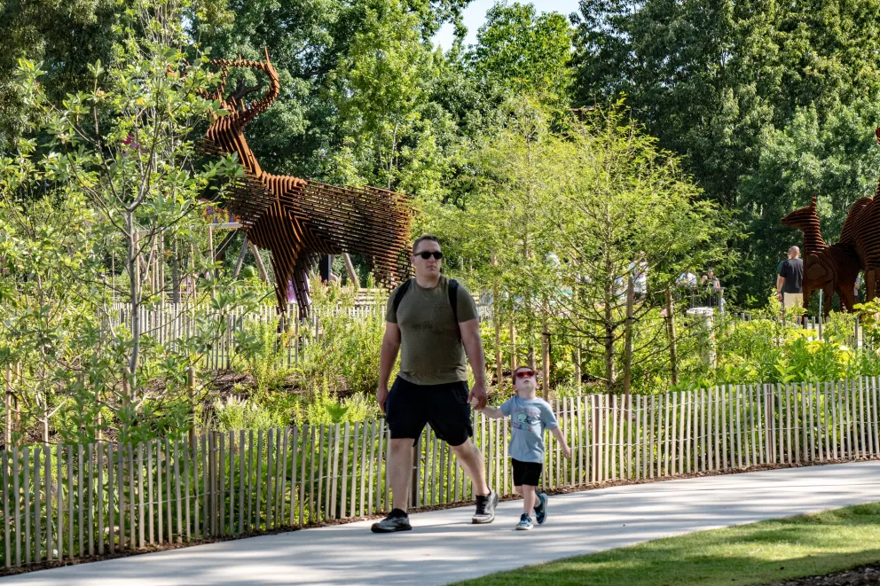 adult and child walking