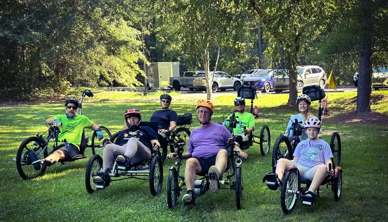 people on adaptive bikes