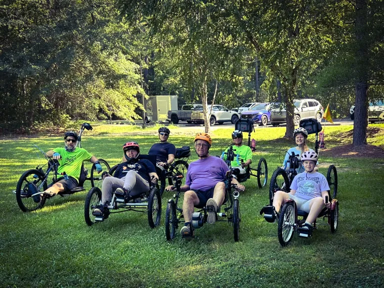 people on adaptive bikes
